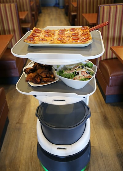 Ledo Pizza Robot carrying food to table